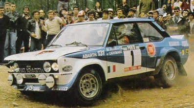 Markku Alén - Illka Kivimaki
15º Rallye de Portugal - Vinho do Porto 1981. Fiat 131 Abarth (TO V39606). Clasificado 1º.

Del 4 al 7 de Marzo, Estoril, Cascais, Lisboa, Portugal.
Superficie: asfalto - tierra.

El Rally tenia un total de 2571.00 km de los que 678.00 km divididos en 46 tramos eran especiales.

Se inscribieron 110 equipos, tomaron la salida 95, finalizaron 24.@
Palabras clave: Markku_Alen;Fiat;Abarth;Portugal;1981