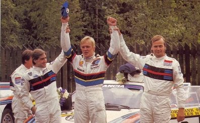 Henri Toivonen, Ari Vatanen y Markku Alén
34º Rally 1000 Lagos 1984 (Finlandia). 
Ari Vatanen, Peugeot 205 T16, Clasificado 1º (4h 08m 49s).
Markku Alén, Lancia Rally 037, Clasificado 2º  (2m 00s).
Henri Toivonen, Lancia Rally 037, Clasificado 3º (4m 08s).
@
Palabras clave: Markku_Alen;Henri_Toivonen;Ari_Vatanen;Peugeot;Lancia;Rally;Personajes;Finlandia;1984