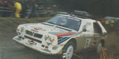 Henri Toivonen - Neil Wilson
34º Lombard RAC Rally 1985. Lancia Delta S4 (A6 37353). Clasificado 1º.

Debut con victoria en el Mundial de Rallyes del Lancia Delta S4.

Del 24 al 28 de Noviembre, Nottingham, Inglaterra.
Superficie: tierra.

El Rally tenia un total de 3507 km de los que 896.98 km divididos en 65 tramos eran especiales, (2 de ellas fueron canceladas, SS43 Kielder Forest - Ogre Hill de 12,02 Km y SS64 Nuss de 8,79 Km).

Tomaron la salida 155 equipos, finalizaron 62.@
Palabras clave: Henri_Toivonen;Neil_Wilson;Lancia;Delta;S4;Grupo_B;Gran_Bretaña;1985