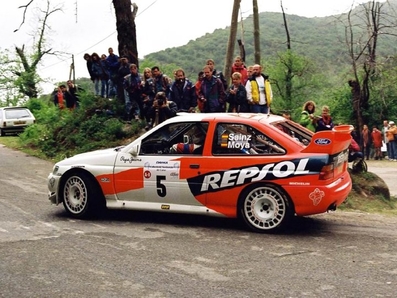 Carlos Sainz Cenamor - Luís Rodríguez Moya
41º Tour de Corse - Rallye de France 1997. Ford Escort WRC (P8 FMC). Clasificado 2º.

Del 5 al 7 de Mayo, Ajaccio, Córcega, Francia.
Superficie: asfalto.

El Rally tenia un total de 998.16 km de los que 408.02 km divididos en 18 tramos eran especiales.

Tomaron la salida 60 equipos, finalizaron 39.@
Palabras clave: ;Luis_Moya;Toyota;Corolla;WRC;Corcega;Corse;1997