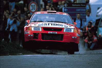 Tommi Mäkinen - Risto Mannisenmaki
41º Rallye Sanremo - Rallye d'Italia 1999. Mitsubishi Lancer Evo VI (V2 MMR). Clasificado 1º.

Del 11 al 13 de Octubre, Sanremo, Liguria, Imperia, Italia.
Superficie: asfalto.

El Rally tenia un total de 1384.58 Km de los que 384.88 Km divididos en 18 tramos, eran especiales.

Se inscribieron 124 equipos, tomaron la salida 119, finalizaron 55.@
Palabras clave: ;Mitsubishi_Lancer;Evo;Sanremo;1999