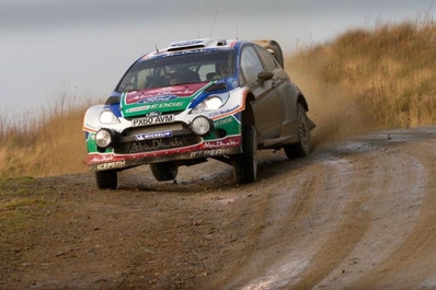 Jari-Matti Latvala - Miikka Anttila
67º Rally de Gales GB 2011. Ford Fiesta RS WRC (PX60 AVM). Clasificado 1º.

Del 10 al 13 de Noviembre, Llandudno, Cardiff.
Superficie: tierra.

El Rally tenia un total de 1860.80 km de los que 353.53 km divididos en 4 etapas y 23 tramos eran especiales.

Tomaron la salida 74, finalizaron 39.@
Palabras clave: ;Miikka_Anttila;Ford;Fiesta;RS;WRC;Gran_Bretaña;Gales;2011