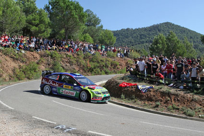 Mikko Hirvonen - Jarmo Lehtinen
45ª RallyRACC Catalunya - Costa Daurada 2009. Ford Focus RS WRC 09 (SA09 VHR). Clasificado 3º.
Tramo: SS1 / SS2 La Mussara 20.48 km.
Viernes 02-10-2009.

Del 1 al 4 de Octubre, Salou, Tarragona, Catalunya, España.
Superficie: asfalto.

El Rally tenia un total de 1299.13 km de los que 353.62 km divididos en 18 tramos eran especiales.

Tomaron la salida 70 equipos, finalizaron 52. 
@
Palabras clave: ;Ford;Focus;WRC;Catalunya;España;Spain