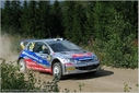 Ari_Vatanen_-_Juha_Repo2C_Peugeot_206_WRC_-_Rally_1000_lagos_2003.jpg