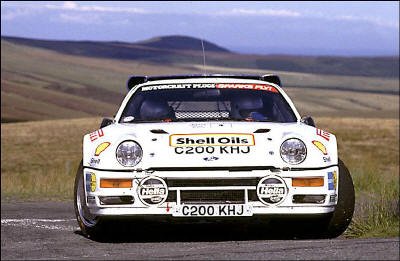 Mark Lovell - Roger Freeman
24º Tudor Webasto Manx International Rally 1986. Ford RS200 (C200 KHJ). Clasificado 3º.

Del 11 al 13 de Septiembre, Douglas, Isla de Man.
Superficie: asfalto.

El Rally tenia un total de 412.85 km cronometrados divididos en 30 tramos especiales (2 de ellos fueron cancelados SS13 Glen Roy de 7.43 km y SS25 West Baldwin de 17.28km)
.
Tomaron la salida 112 equipos, finalizaron 55.@
Palabras clave: Mark_Lovell;Ford;RS200;Grupo_B;Manx;1986