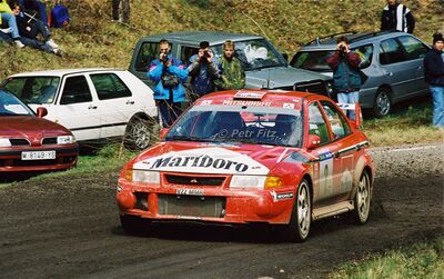 Freddy Loix - Sven Smeets
36º Rallye Catalunya - Costa Brava - Rallye de España 2000. Mitsubishi Lancer Evo VI (V22 MMR). Clasificado 8º.

Del 30 de Marzo al 2 de Abril, Lloret de Mar, Girona, Catalunya, España.
Superficie: asfalto.

El Rally tenia un total de 1874.7 km de los que 383.09 km divididos en 15 tramos eran especiales.

Se inscribieron 95 equipos, tomaron la salida 91, finalizaron 55.

© Petr Fitz@@
Palabras clave: Catalunya;Costa_Brava;España;Spain;Mitsubishi;Lancer;Evo;2000