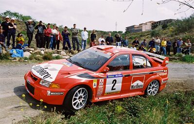Freddy Loix - Sven Smeets
36º Rallye Catalunya - Costa Brava - Rallye de España 2000. Mitsubishi Lancer Evo VI (V22 MMR). Clasificado 8º.

Del 30 de Marzo al 2 de Abril, Lloret de Mar, Girona, Catalunya, España.
Superficie: asfalto.

El Rally tenia un total de 1874.7 km de los que 383.09 km divididos en 15 tramos eran especiales.

Se inscribieron 95 equipos, tomaron la salida 91, finalizaron 55.

© Petr Fitz
@@
Palabras clave: Catalunya;Costa_Brava;España;Spain;Mitsubishi;Lancer;Evo;2000