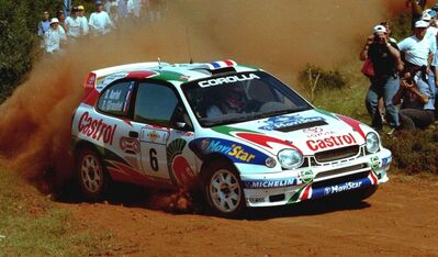 Didier Auriol - Denis Giraudet
45º Acropolis Rally de Grecia 1998. Toyota Corolla WRC (K-AM 156). Clasificado 2º.

Del 7 al 9 de Junio, Atenas, Delfi.
Superficie: tierra.

El Rally tenia un total de 1036.49 Km de los que 388.76 Km divididos en 17 tramos eran especiales (uno de ellos fue cancelada SS2 Skourta de 20.65 Km).

Se inscribieron 105 equipos, tomaron la salida 102, finalizaron 59.@
Palabras clave: Didier_Auriol;Grecia;Acropolis;Toyota;Corolla;WRC;1998