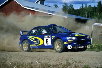 Juha Kankkunen - Juha Repo
49º Neste Rally Finland 1999. Subaru Impreza S5 WRC '99 (T11 SRT). Clasificado 1º.
Subaru World Rally Team

Del 20 al 22 de Agosto, Jyväskylä.
Superficie: tierra.

El Rally tenia un total de 1218.42 km de los que 377.26 km divididos en 23 tramos eran especiales.

Se inscribieron 131 equipos, tomaron la salida 129, finalizaron 64.

© Girardo & Co.
@
Palabras clave: ;Subaru;Impreza;WRC;Finlandia;1999