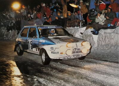 Attilio Bettega - Mario Mannucci
48º Rallye Automobile de Monte-Carlo 1980. Fiat Ritmo 75 Abarth (TO U22645). Clasificado 6º.

Del 19 al 25 de Enero, Monte-Carlo.
Superficie: asfalto - nieve.

El Rally tenia un total de 3063.30 km de los que 695.30 km divididos en 33 tramos eran especiales (4 de ellas fueron canceladas SS17 Pont du Fosse - Romette de 21 Km, SS20 Col du Corobin de 15 Km, SS32 Pont des Miolans - St Auban 2 de 24 Km y SS33 Roquesteron - Boyon 3 de 18 Km).

Se inscribieron 255 equipos, tomaron la salida 237, finalizaron 88.@
Palabras clave: ;Fiat;Ritmo;Abarth;Montecarlo;nieve;1980