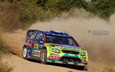 Jari-Matti Latvala - Miikka Anttila
46º RallyRACC Catalunya - Costa Daurada 2010. Ford Focus RS WRC 09 (PX08 AXB). Clasificado 4º.

Del 20 al 24 de Octubre, Salou, Tarragona, Catalunya, España.
Superficie: asfalto - tierra.

El Rally tenia un total de 1301.70 km de los que 355.30 km estaban divididos en 3 etapas y 19 tramos especiales.

Tomaron la salida 48 equipos, finalizaron 36.

© Greg Roslon
@@
Palabras clave: ;Ford;Focus;WRC;Catalunya;2010