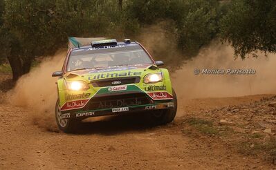 Jari-Matti Latvala - Miikka Anttila
46º RallyRACC Catalunya - Costa Daurada 2010. Ford Focus RS WRC 09 (PX08 AXB). Clasificado 4º.

Del 20 al 24 de Octubre, Salou, Tarragona, Catalunya, España.
Superficie: asfalto - tierra.

El Rally tenia un total de 1301.70 km de los que 355.30 km estaban divididos en 3 etapas y 19 tramos especiales.

Tomaron la salida 48 equipos, finalizaron 36.

© Monica Parisotto
@@
Palabras clave: ;Ford;Focus;WRC;Catalunya;2010