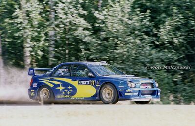 Petter Solberg - Phil Mills
52º Neste Rally Finland 2002. Subaru Impreza S7 WRC 01. Clasificado 3º.

Del 8 al 11 de Agosto, Jyväskylä.
Superficie: tierra.

El Rally tenia un total de 1703.32 km de los que 401.68 km divididos en 22 tramos eran especiales.

Tomaron la salida 77 esquipos, finalizaron 30.

© Piotr Malczewski
@
Palabras clave: Petter_Solberg;Subaru;Impreza;Finlandia;2002