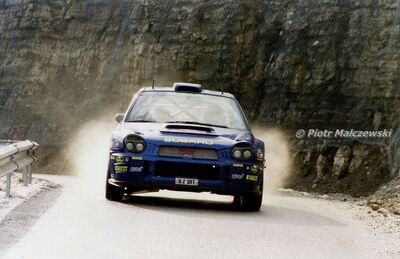 Richard Burns - Robert Reid
69º Rallye Automobile de Monte-Carlo 2001. Subaru Impreza S7 WRC '01 (X2 SRT). Abandonó por problemas eléctricos y no arrancar el coche antes del primer tramo de la segunda etapa SS7 BIF. D1/C1 - Turriers de 24.12 km.

Del 18 al 21 de Enero, Mónaco.
Superficie: asfalto - nieve.

El Rally tenia un total de 1738.81 km de los que 392.18 km divididos en 15 tramos eran especiales, (una de ellas fue cancelada SS10 Comps 2 de 20.53 Km).

Se inscribieron 60 equipos, tomaron la salida 56, finalizaron 27.

© Piotr Malczewski
@
Palabras clave: Subaru;Impreza;WRC;Montecarlo;2001