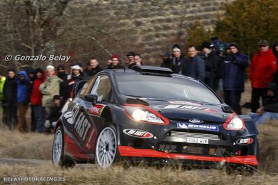 Matthew Wilson - Scott Martin
80º Rallye Automobile de Monte-Carlo 2012. Ford Fiesta RS WRC (PX60 AVE). Clasificado 11º.

Del 17 al 22 de Enero, Valence - Monaco.
Superficie: asfalto - nieve.

El Rally teni­a un total de 1772.52 km de los que 433.36 Km divididos en 18 tramos eran especiales.

Se inscribieron 82 equipos, tomaron la salida 73, finalizaron 45.

© Gonzalo Belay
@@
Palabras clave: Ford;Fiesta;WRC;2012;Montecarlo
