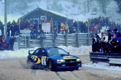 Colin McRae - Nicky Grist
66º Rallye Automobile de Monte-Carlo 1998. Subaru Impreza S5 WRC '98 (P7 WRC). Clasificado 3º.

Del 19 al 21 de Enero, Monte-Carlo.
Superficie: asfalto - nieve.

El Rally tenia un total de 1454.53 km de los que 359.19 km divididos en 18 tramos eran especiales.

Tomaron la salida 106 equipos, finalizaron 60.@
Palabras clave: ;Subaru;Impreza;WRC;Montecarlo;1998