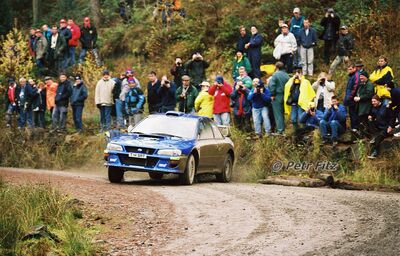 Richard Burns - Robert Reid
55º Network Q Rally de Gran Bretaña 1999. Subaru Impreza S5 WRC '99 (T 14 SRT). Clasificado 1º.

Del 21 al 23 de Noviembre, Cheltenham.
Superficie: tierra - asfalto.

El Rally tení­a un total de 1815.48 km de los que 389.39 km divididos en 22 tramos eran especiales.

Se inscribieron 186 equipos, tomaron la salida 160, finalizaron 89.

© Petr Fitz
@@
Palabras clave: Richard_Burns;Subaru;Impreza;Gran_Bretaña;WRC;1999