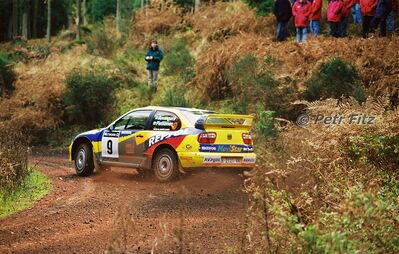Harri Rovanperä - Risto Pietiläinen
55º Network Q Rally de Gran Bretaña 1999. Seat Cordoba WRC Evo2 (B-2121-VN). Clasificado 3º.

Del 21 al 23 de Noviembre, Cheltenham.
Superficie: tierra - asfalto.

El Rally tení­a un total de 1815.48 km de los que 389.39 km divididos en 22 tramos eran especiales.

Se inscribieron 186 equipos, tomaron la salida 160, finalizaron 89.

© Petr Fitz
@@
Palabras clave: ;Seat;Cordoba;WRC;Evo2;Gran_Bretaña;1999