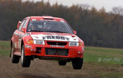 Freddy Loix - Sven Smeets
55º Network Q Rally de Gran Bretaña 1999. Mitsubishi Lancer Evo VI (S33 TMR). Clasificado 5º.

Del 21 AL 23 de Noviembre, Cheltenham.
Superficie: tierra - asfalto.

El Rally tení­a un total de 1815.48 km de los que 389.39 km divididos en 22 tramos eran especiales.

Se inscribieron 186 equipos, tomaron la salida 160, finalizaron 89.

© Petr Fitz
@@
Palabras clave: Mitsubishi;Lancer;Gran_Bretaña;1999;WRC;
