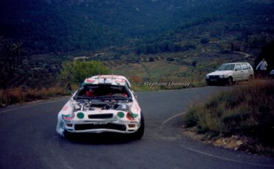 Juha Kankkunen - Nicky Grist
31º Rallye Catalunya - Costa Brava - Rallye de España 1995. Toyota Celica GT-Four "ST205" (K-AM 2390). Abandonó por accidente en SS16 Capafons de 28.90 Km.

Al finalizar el Rally el Equipo Toyota Castrol Team fue descalificado por manipular el turbo de sus coches.

Del 23 al 25 de Octubre, Lloret de Mar, Girona, Catalunya, España.
Superficie: asfalto.

El Rally tenia un total de 1663.71 km de los que 474.35 km divididos en 23 tramos eran especiales.

Tomaron la salida 81 equipos, finalizaron 42.

© Stéphane Lhonnay
@
Palabras clave: ;Toyota;Celica;Catalunya;España;Spain;1995;Crash