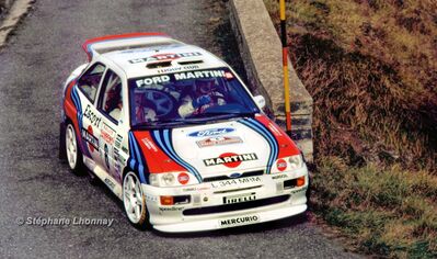 Gianfranco Cunico - Stefano Evangelisti
36º Rallye San Remo - Rallye de Italia 1994. Ford Escort RS Cosworth (L 344 MRM). Clasificado 6º.

Del 9 al 13 de Octubre, Sanremo, Liguria, Imperia, Italia.
Superficie: asfalto - tierra.

El Rally tenia un total de 2160.40 km de los que 526.03 km divididos en 26 tramos eran especiales (una de ellas fue cancelada SS17 Roncola de 9.40 km).

Se inscribieron 94 equipos, tomaron la salida 92, finalizaron 40.

© Stéphane Lhonnay
@
Palabras clave: ;Ford;Escort;Cosworth;Sanremo;1994