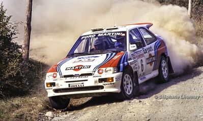 Gianfranco Cunico - Stefano Evangelisti
36º Rallye San Remo - Rallye de Italia 1994. Ford Escort RS Cosworth (L 344 MRM). Clasificado 6º.

Del 9 al 13 de Octubre, Sanremo, Liguria, Imperia, Italia.
Superficie: asfalto - tierra.

El Rally tenia un total de 2160.40 km de los que 526.03 km divididos en 26 tramos eran especiales (una de ellas fue cancelada SS17 Roncola de 9.40 km).

Se inscribieron 94 equipos, tomaron la salida 92, finalizaron 40.

© Stéphane Lhonnay
@
Palabras clave: ;Ford;Escort;Cosworth;Sanremo;1994