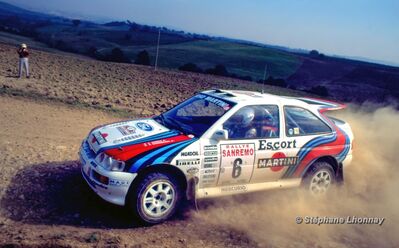 Gianfranco Cunico - Stefano Evangelisti
36º Rallye San Remo - Rallye de Italia 1994. Ford Escort RS Cosworth (L 344 MRM). Clasificado 6º.

Del 9 al 13 de Octubre, Sanremo, Liguria, Imperia, Italia.
Superficie: asfalto - tierra.

El Rally tenia un total de 2160.40 km de los que 526.03 km divididos en 26 tramos eran especiales (una de ellas fue cancelada SS17 Roncola de 9.40 km).

Se inscribieron 94 equipos, tomaron la salida 92, finalizaron 40.

© Stéphane Lhonnay
@
Palabras clave: ;Ford;Escort;Cosworth;Sanremo;1994