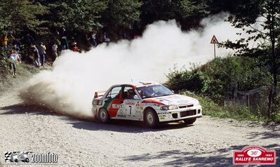Armin Schwarz - Klaus Wicha
36º Rallye Sanremo - Rallye de Italia 1994. Mitsubishi Lancer Evo II (K5 MRE). Abandonó por fuego en la última especial SS26 Molini di Triora de 18.34 Km.

Del 9 al 13 de Octubre, Sanremo, Liguria, Imperia, Italia.
Superficie: asfalto - tierra.

El Rally tenia un total de 2160.40 km de los que 526.03 km divididos en 26 tramos eran especiales (una de ellas fue cancelada SS17 Roncola de 9.40 km).

Se inscribieron 94 equipos, tomaron la salida 92, finalizaron 40.

© Zoom Foto - Sergio Biancolli
@
Palabras clave: ;Mitsubishi;Lancer;Sanremo;1994;Italia