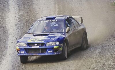 Juha Kankkunen - Juha Repo
29º Rally New Zealand 1999. Subaru Impreza S5 WRC 99 (S7 SRT). Clasificado 1º.

Del 15 al 18 de Julio, Auckland, Manukau, Nueva Zelanda.
Superficie: tierra.

El Rally constaba de 3 etapas con un total de 1675.63 km de los que 399.84 km divididos en 27 tramos eran especiales.

Tomaron la salida 82 equipos, finalizaron 46.@
Palabras clave: ;Subaru;Impreza;WRC;Nueva_Zelanda;1999