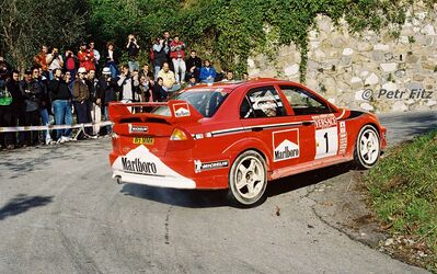Tommi Mäkinen - Risto Mannisenmäki
47º Rallye Sanremo - Rallye d'Italia 2000. Mitsubishi Lancer Evo VI (V9 MMR). Clasificado 3º.

Del 19 al 22 de Octubre, Sanremo.
Superficie: asfalto.

El Rally tenia un total de 1065.75 Km de los que 382.79 Km divididos en 17 tramos eran especiales (uno de ellos fue cancelado SS15 Langan 2 de 37.81 Km.

Se inscribieron 123 equipos, tomaron la salida 115, finalizaron 62.

© Petr Fitz
@@
Palabras clave: ;Mitsubishi;Lancer;Sanremo;2000