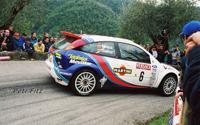 Carlos Sainz - Luís Moya
42º Rallye Sanremo - Rallye d'Italia 2000. Ford Focus WRC '00 (V10 FMC). Clasificado 5º.

Del 19 al 22 de Octubre, Sanremo.
Superficie: asfalto.

El Rally tenia un total de 1065.75 Km de los que 382.79 Km divididos en 17 tramos eran especiales (uno de ellos fue cancelado SS15 Langan 2 de 37.81 Km.

Se inscribieron 123 equipos, tomaron la salida 115, finalizaron 62.

© Petr Fitz
@@
Palabras clave: ;Luis_Moya;Ford;Focus;WRC;Sanremo;2000