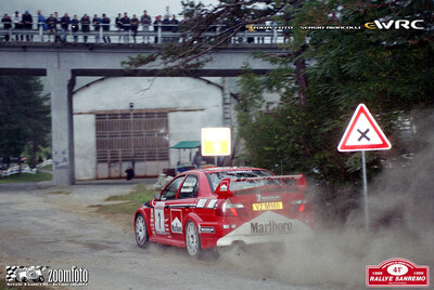 Tommi Mäkinen - Risto Mannisenmaki
41º Rallye Sanremo - Rallye d'Italia 1999. Mitsubishi Lancer Evo VI (V2 MMR). Clasificado 1º.
Marlboro Mitsubishi Ralliart

Del 11 al 13 de Octubre, Sanremo, Liguria, Imperia, Italia.
Superficie: asfalto.

El Rally tenia un total de 1384.58 Km de los que 384.88 Km divididos en 18 tramos, eran especiales.

Se inscribieron 124 equipos, tomaron la salida 119, finalizaron 55.

© Zoom Foto - Sergio Biancolli
@@
Palabras clave: Mitsubishi;Lancer;Sanremo;1999