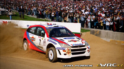 Colin McRae - Nicky Grist
33º TAP Rallye de Portugal 1999. Ford Focus WRC '99 (S7 FMC). Clasificado 1º.
Ford Motor Co. Ltd.

Del 21 al 24 de Marzo, Matosinhos, Porto, Portuigal.
Superficie: tierra.

El Rally tení­a un total de 1768.61 km de los que 399.51 km divididos en 23 tramos eran especiales (dos de ellos fueron cancelados SS18 Arganil - Coja 2 de 20.96 km y SS19 Salgueiro - Gois 2 de 19.70 km).

Se inscribieron 117 equipos, tomaron la salida 117, finalizaron 56.

© Jan Marek
@@
Palabras clave: Ford;Focus;WRC;Portugal;1999