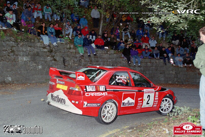 Freddy Loix - Sven Smeets
41º Rallye Sanremo - Rallye d'Italia 1999. Mitsubishi Lancer Evo VI (V22 MMR). Clasificado 4º.
Marlboro Mitsubishi Ralliart

Del 11 al 13 de Octubre, Sanremo, Liguria, Imperia, Italia.
Superficie: asfalto.

El Rally tenia un total de 1384.58 Km de los que 384.88 Km divididos en 18 tramos, eran especiales.

Se inscribieron 124 equipos, tomaron la salida 119, finalizaron 55.

© Zoom Foto - Sergio Biancolli
@@
Palabras clave: Mitsubishi;Lancer;Sanremo;1999