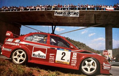 Freddy Loix - Sven Smeets
35º Rallye Catalunya - Costa Brava - Rallye de España 1999. Mitsubishi Lancer Evo VI (S22 TMR). Clasificado 4º.
Marlboro Mitsubishi Ralliart

Del 19 al 21 de Abril, Lloret de Mar, Girona, Catalunya, España.
Superficie: asfalto.

El Rally tenia un total de 1713.31 km de los que 396.01 km divididos en 19 tramos eran especiales.

Se inscribieron 109 equipos, tomaron la salida 109, finalizaron 56.@
Palabras clave: ;Mitsubishi;Lancer;Catalunya;España;Spain;1999