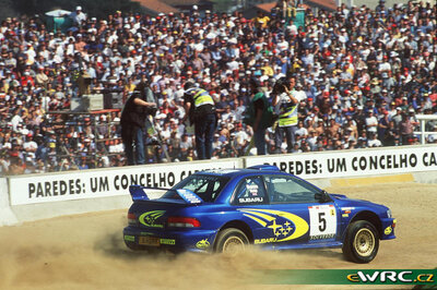 Richard Burns - Robert Reid
33º TAP Rallye de Portugal 1999. Subaru Impreza S5 WRC '99 (S9 SRT). Clasificado 4º.
Subaru World Rally Team

Del 21 al 24 de Marzo, Matosinhos, Porto, Portuigal.
Superficie: tierra.

El Rally tení­a un total de 1768.61 km de los que 399.51 km divididos en 23 tramos eran especiales (dos de ellos fueron cancelados SS18 Arganil - Coja 2 de 20.96 km y SS19 Salgueiro - Gois 2 de 19.70 km).

Se inscribieron 117 equipos, tomaron la salida 117, finalizaron 56.

© Teams
@@
Palabras clave: Subaru;Impreza;WRC;Portugal;2007