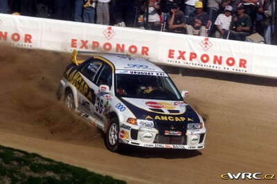 Gustavo Trelles - Martin Christie
33º TAP Rallye de Portugal 1999. Mitsubishi Lancer Evo V (BB 044 ZK). Clasificado 15º.
Ralliart Italia

Del 21 al 24 de Marzo, Matosinhos, Porto, Portuigal.
Superficie: tierra.

El Rally tení­a un total de 1768.61 km de los que 399.51 km divididos en 23 tramos eran especiales (dos de ellos fueron cancelados SS18 Arganil - Coja 2 de 20.96 km y SS19 Salgueiro - Gois 2 de 19.70 km).

Se inscribieron 117 equipos, tomaron la salida 117, finalizaron 56.

© Jan Marek
@@
Palabras clave: Mitsubishi;Lancer;Portugal;1999