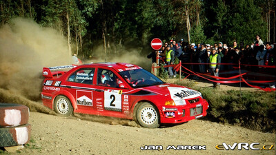 Marcus Grönholm - Timo Rautiainen
33º TAP Rallye de Portugal 1999. Mitsubishi Carisma GT Evo VI (S33 TMR). Abandonó por la transmisión del coche en SS16 Arganil - Coja 1 de 20.96 Km.
Marlboro Mitsubishi Ralliart

Del 21 al 24 de Marzo, Matosinhos, Porto, Portuigal.
Superficie: tierra.

El Rally tení­a un total de 1768.61 km de los que 399.51 km divididos en 23 tramos eran especiales (dos de ellos fueron cancelados SS18 Arganil - Coja 2 de 20.96 km y SS19 Salgueiro - Gois 2 de 19.70 km).

Se inscribieron 117 equipos, tomaron la salida 117, finalizaron 56.

© Jan Marek
@@
Palabras clave: Mitsubishi;Carisma;Portugal;1999