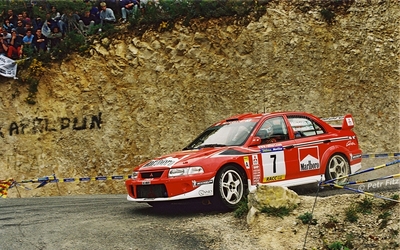 Tommi Mäkinen - Risto Mannisenmaki
37º Rallye Catalunya - Costa Brava - Rallye de España 2001. Mitsubishi Lancer Evo 6.5 (X6 MMR). Clasificado 3º.
Marlboro Mitsubishi Ralliart

Del 22 al 25 de Marzo, Lloret de Mar, Girona, Catalunya, España.
Superficie: asfalto.

El Rally tenia un total de 1779.13 km de los que 383.18 km divididos en 18 tramos eran especiales, (una de ellas fue cancelada SS12 La Riba 2 de 35.89 Km).

Se inscribieron 79 equipos, tomaron la salida 76, finalizaron 36.

© Petr Fitz
@
Palabras clave: Mitsubishi_Lancer;Evo;Catalunya;2001;España;Spain
