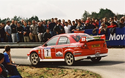 Tommi Mäkinen - Risto Mannisenmaki
37º Rallye Catalunya - Costa Brava - Rallye de España 2001. Mitsubishi Lancer Evo 6.5 (X6 MMR). Clasificado 3º.
Marlboro Mitsubishi Ralliart

Del 22 al 25 de Marzo, Lloret de Mar, Girona, Catalunya, España.
Superficie: asfalto.

El Rally tenia un total de 1779.13 km de los que 383.18 km divididos en 18 tramos eran especiales, (una de ellas fue cancelada SS12 La Riba 2 de 35.89 Km).

Se inscribieron 79 equipos, tomaron la salida 76, finalizaron 36.

© Petr Fitz
@
Palabras clave: Mitsubishi_Lancer;Evo;Catalunya;2001;España;Spain
