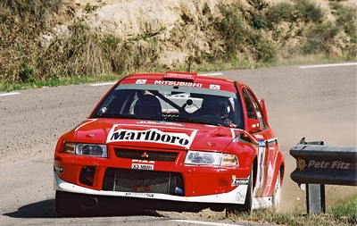 Freddy Loix - Sven Smeets
37º Rallye Catalunya - Costa Brava - Rallye de España 2001. Mitsubishi Carisma GT Evo VI (X3 MMR). Clasificado 4º.
Marlboro Mitsubishi Ralliart

Del 22 al 25 de Marzo, Lloret de Mar, Girona, Catalunya, España.
Superficie: asfalto.

El Rally tenia un total de 1779.13 km de los que 383.18 km divididos en 18 tramos eran especiales, (una de ellas fue cancelada SS12 La Riba 2 de 35.89 Km).

Se inscribieron 79 equipos, tomaron la salida 76, finalizaron 36.

© Petr Fitz
@
Palabras clave: Mitsubishi;Catalunya;Costa_Brava;España;2001;Spain