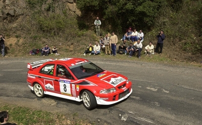 Freddy Loix - Sven Smeets
37º Rallye Catalunya - Costa Brava - Rallye de España 2001. Mitsubishi Carisma GT Evo VI (X3 MMR). Clasificado 4º.
Marlboro Mitsubishi Ralliart

Del 22 al 25 de Marzo, Lloret de Mar, Girona, Catalunya, España.
Superficie: asfalto.

El Rally tenia un total de 1779.13 km de los que 383.18 km divididos en 18 tramos eran especiales, (una de ellas fue cancelada SS12 La Riba 2 de 35.89 Km).

Se inscribieron 79 equipos, tomaron la salida 76, finalizaron 36.@
Palabras clave: Mitsubishi;Catalunya;Costa_Brava;España;2001;Spain