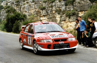 Freddy Loix - Sven Smeets
37º Rallye Catalunya - Costa Brava - Rallye de España 2001. Mitsubishi Carisma GT Evo VI (X3 MMR). Clasificado 4º.
Marlboro Mitsubishi Ralliart

Del 22 al 25 de Marzo, Lloret de Mar, Girona, Catalunya, España.
Superficie: asfalto.

El Rally tenia un total de 1779.13 km de los que 383.18 km divididos en 18 tramos eran especiales, (una de ellas fue cancelada SS12 La Riba 2 de 35.89 Km).

Se inscribieron 79 equipos, tomaron la salida 76, finalizaron 36.

© Piotr Malczewski
@@
Palabras clave: Mitsubishi;Catalunya;Costa_Brava;España;2001;Spain