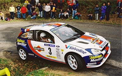 Carlos Sainz Cenamor - Lui­s Moya
37º Rallye Catalunya - Costa Brava - Rallye de España 2001. Ford Focus WRC '01 (V10 FMC). Clasificado 5º.
Ford Motor Co. Ltd.

Del 22 al 25 de Marzo, Lloret de Mar, Girona, Catalunya, España.
Superficie: asfalto.

El Rally tenia un total de 1779.13 km de los que 383.18 km divididos en 18 tramos eran especiales, (una de ellas fue cancelada SS12 La Riba 2 de 35.89 Km).

Se inscribieron 79 equipos, tomaron la salida 76, finalizaron 36.

© Petr Fitz
@
Palabras clave: Ford;Focus;WRC;Catalunya;Costa_Brava;España;2001;Spain