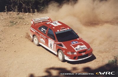 Freddy Loix - Sven Smeets
48º Acropolis Rally 2001. Mitsubishi Lancer Evo 6.5 (V2 MMR). Clasificado 9º.
Marlboro Mitsubishi Ralliart

Del 14 al 17 de Junio, Atenas, Grecia.
Superficie: tierra.

El Rally tenia un total de 1613.98 km de los que 387.41 km divididos en 20 tramos eran especiales ((uno de ellos fue cancelado SS5 Elatia de 31.40 Km).

Tomaron la salida 110 equipos, finalizaron 47.

© George Faskiotis
@
Palabras clave: Freddy_Loix;Acropolis;Grecia;Mitsubishi;Lancer;2001