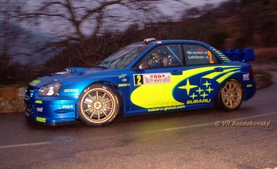 Mikko Hirvonen - Jarmo Lehtinen
72º Rallye Automobile de Monte-Carlo 2004. Subaru Impreza S9 WRC 03 (S 800 WRT). Abandonó por accidente en SS9 Sigale - Col de Bleine 1 de 28.39 km.

Del 23 al 25 de Enero, Monaco.
Superficie: asfalto.

El Rally tenia un total de 1,331.92 Km de los que 389.12 Km divididos en 15 tramos, eran especiales (2 de ellos fueron cancelados SS1 Selonnet - Breziers 1 de 22.64 Km y SS10 Tourette du Chateau - St Antonin 2 de 24.80 Km. Uno de ellos se dio con tiempo de tramo teórico a todos los equipos, SS8 Tourette du Chateau - St Antonin 1 de 24.80 Km).

Se inscribieron 45 equipos, tomaron la salida 43, finalizaron 20.

© Vít Bezdekovský
@
Palabras clave: ;Montecarlo;Subaru;Impreza;WRC;2004