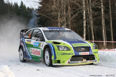 Marcus Grönholm - Timo Rautiainen
55º Uddeholm Swedish Rally 2006. Ford Focus RS WRC 06 (EU55 BMV). Clasificado 1º.
BP Ford World Rally Team

Cuarta victoria de Marcus Grönholm en Suecia y 50º victoria de Ford en el WRC.

Del 3 al 5 de Febrero, Karlstad, Värmland County.
Superficie: nieve - hielo.

El Rally constaba de 3 etapas con un total de 1441.16 km de los que 349.02 km divididos en 19 tramos eran cronometrados.

Tomaron la salida 63 equipos, finalizaron 51.

© Joachim Hähn
@
Palabras clave: Ford;Focus;WRC;Suecia;2006;Nieve