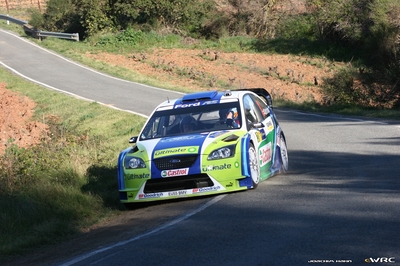 Marcus Grönholm - Timo Rautiainen
42º RallyRACC Catalunya - Costa Daurada 2006. Ford Focus RS WRC '06 (EU55 BMV). Clasificado 3º.
BP Ford World Rally Team

Del 24 al 26 de Marzo, Salou, Tarragona, Catalunya, España.
Superficie: asfalto.

El Rally tenia un total de 1376.14 Km de los que 346.43 Km divididos en 16 tramos eran especiales.

Se inscribieron 71 equipos, tomaron la salida 66, finalizaron 56.

© Joachim Hähn
@@
Palabras clave: Ford;Focus;WRC;Catalunya;España;Spain;2006