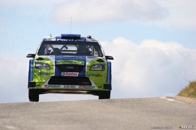Marcus Grönholm - Timo Rautiainen
42º RallyRACC Catalunya - Costa Daurada 2006. Ford Focus RS WRC '06 (EU55 BMV). Clasificado 3º.
BP Ford World Rally Team

Del 24 al 26 de Marzo, Salou, Tarragona, Catalunya, España.
Superficie: asfalto.

El Rally tenia un total de 1376.14 Km de los que 346.43 Km divididos en 16 tramos eran especiales.

Se inscribieron 71 equipos, tomaron la salida 66, finalizaron 56.

© Joachim Hähn
@@
Palabras clave: Ford;Focus;WRC;Catalunya;España;Spain;2006