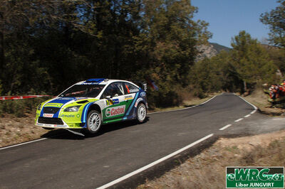 Marcus Grönholm - Timo Rautiainen
42º RallyRACC Catalunya - Costa Daurada 2006. Ford Focus RS WRC '06 (EU55 BMV). Clasificado 3º.
BP Ford World Rally Team

Del 24 al 26 de Marzo, Salou, Tarragona, Catalunya, España.
Superficie: asfalto.

El Rally tenia un total de 1376.14 Km de los que 346.43 Km divididos en 16 tramos eran especiales.

Se inscribieron 71 equipos, tomaron la salida 66, finalizaron 56.

© Libor Jungvirt
@@
Palabras clave: Ford;Focus;WRC;Catalunya;España;Spain;2006